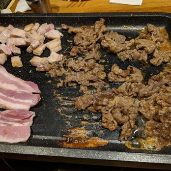 Mr Kimchi - Golf Road - Bulgogi and garlic pork belly and regular pork belly. - Korean Near Me - Mount Prospect, Illinois Mr Kimchi - Golf Road - Bulgogi and garlic pork belly and regular pork belly. - Korean Near Me - Mount Prospect, Illinois