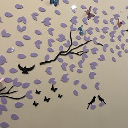 Extreme Auto Pros - birds and butterflies in a tree