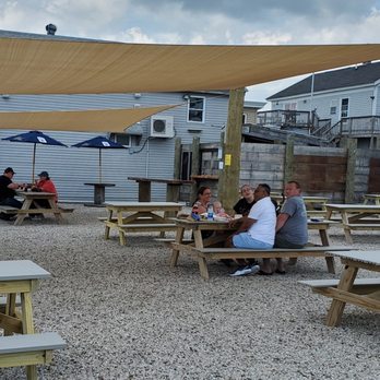 Huot's Seafood Restaurant - people sitting at picnic tables - Seafood Near Me - Saco, Maine