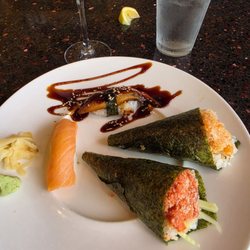 Spicy tuna handroll, spicy salmon handroll, smoked salmon sushi, eel sushi