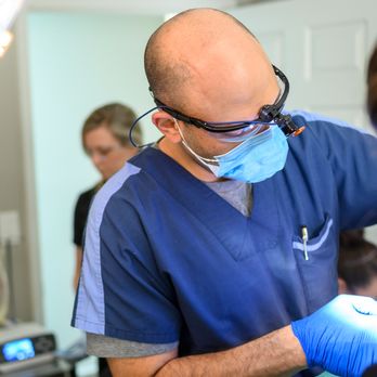 LaGrange Oral Surgery & Implant Center - Dr. Jacobs examining patient - Oral Surgeons Near Me - LaGrange, Georgia LaGrange Oral Surgery & Implant Center - Dr. Jacobs examining patient - Oral Surgeons Near Me - LaGrange, Georgia