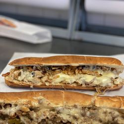 Super Extreme Heros - Chicken and steak cheesesteaks