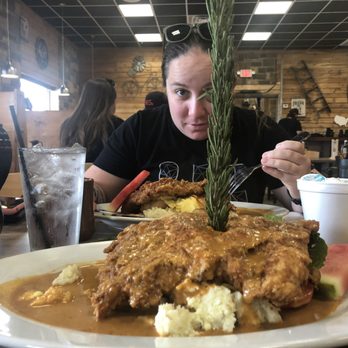 Chops & Eggs - My daughter hiding behind a tasty chicken - New American Near Me - Corpus Christi, Texas Chops & Eggs - My daughter hiding behind a tasty chicken - New American Near Me - Corpus Christi, Texas