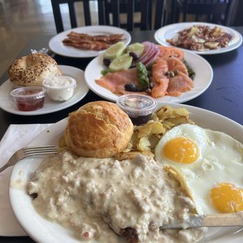 Egg Shells Restaurant - Front: Country Fried Steak with Sausage Gravy;Center row: Salmon Platter & Everything Bagel;Back row:Bacon & Corned Beef Hash - Breakfast & Brunch Near Me - Lake Zurich, Illinois Egg Shells Restaurant - Front: Country Fried Steak with Sausage Gravy;Center row: Salmon Platter & Everything Bagel;Back row:Bacon & Corned Beef Hash - Breakfast & Brunch Near Me - Lake Zurich, Illinois