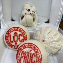 Bakery Ngoc Lan - Full bao (2 bao that states "Phuc Loc" has mung bean coconut fillings), cha sui bao, and bunny bao (sausage)