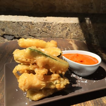 Revoltosa - CALABACÍN EN TEMPURA CON MOJO - Dive Bars Near Me - Madrid, M Revoltosa - CALABACÍN EN TEMPURA CON MOJO - Dive Bars Near Me - Madrid, M