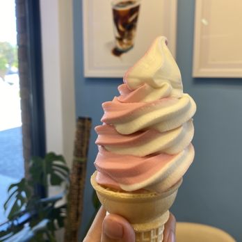 Yours Conveniently - a hand holding a cone of ice cream - Cafes Near Me - Aurora, Ontario