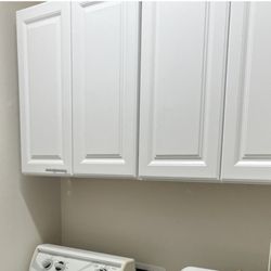 Martinez Painting & Handyman Services - Cabinets in laundry room