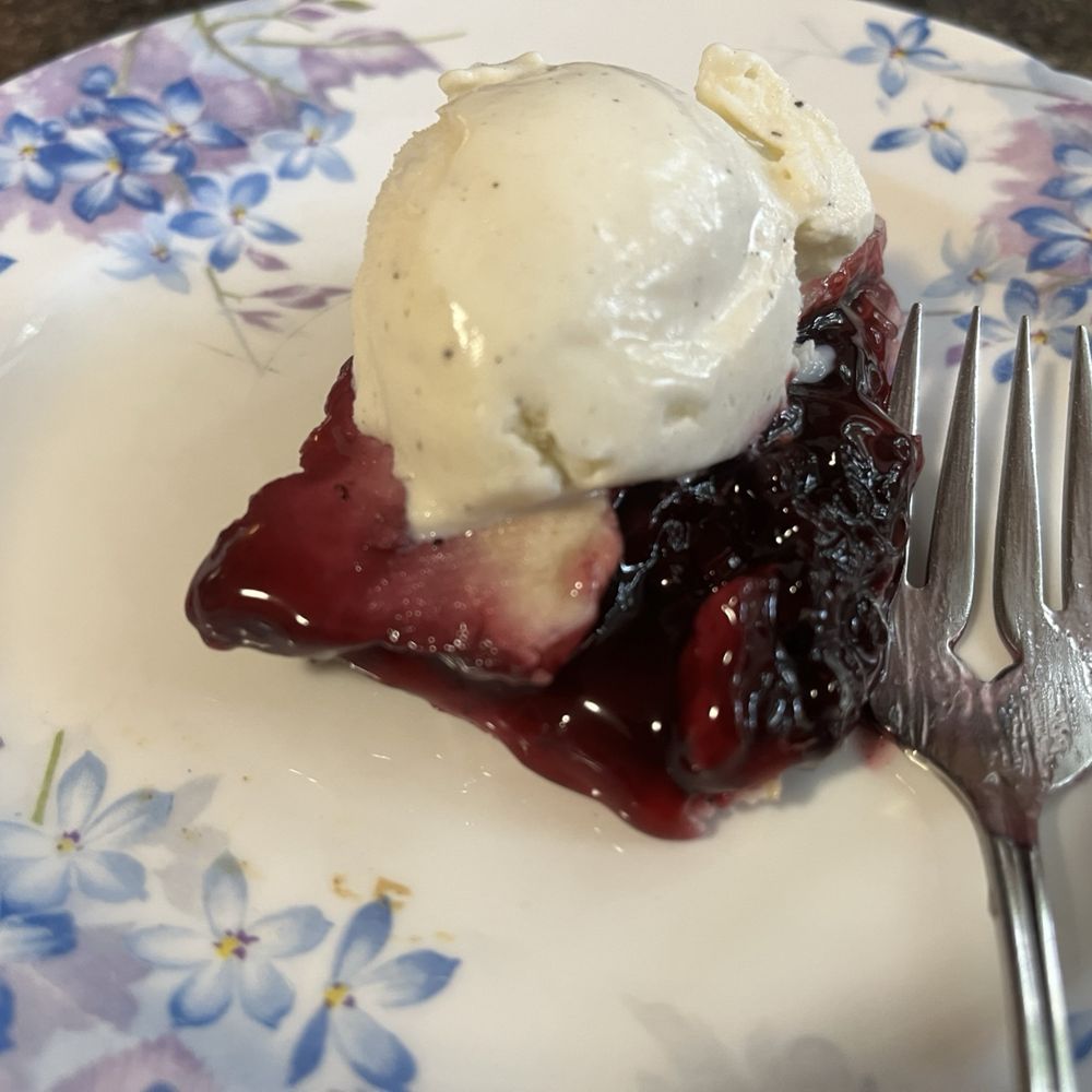 Laury's Restaurant - Blackberry Cobbler with Vanilla ice cream had to be to-go!! - Steakhouses Near Me - Charleston, West Virginia Laury's Restaurant - Blackberry Cobbler with Vanilla ice cream had to be to-go!! - Steakhouses Near Me - Charleston, West Virginia