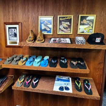 Scott Hawaii - Art decor and slippers display - Shoe Stores Near Me - Honolulu, Hawaii
