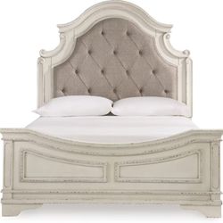 Realyn upholstered bed by Ashley Furniture.