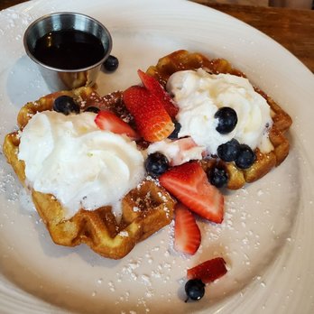 Orange Blossom - Very soggy and inedible waffles with ARTIFICIAL pancake syrup (menu stated maple syrup, which they don't even have). - Breakfast & Brunch Near Me - Miami Beach, Florida