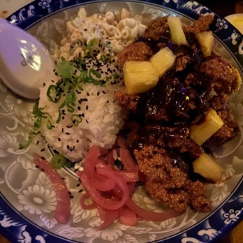 Suzume - Hawaiian Fried Chicken Rice Bowl - A dish featuring fried chicken with pineapple chunks, served alongside rice topped with green onions, macaroni salad, and pickled onions. - Ramen Near Me - Brooklyn, New York