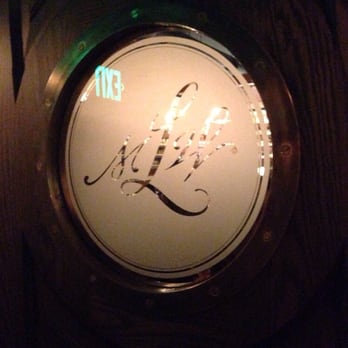 Multnomah Whiskey Library - Logo on door - Lounges Near Me - Portland, Oregon