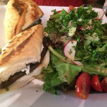 Monets Wine Bistro - Tuscan panini with spicy lamb ($16.50) with salad on the side - French Near Me - Exeter, California