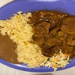 Beef stew with rice and beans. Full of flavor!