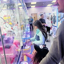 Crane Games - Kids playing crane machines