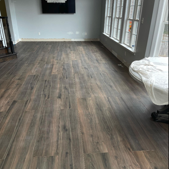 Revest Construction - a hardwood floor in a living room - Flooring Near Me - North Chesterfield, Virginia Revest Construction - a hardwood floor in a living room - Flooring Near Me - North Chesterfield, Virginia