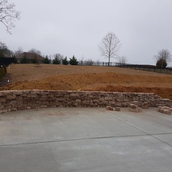 Vazquez Visions Masonry - a view of the back yard of a home under construction - Masonry/Concrete Near Me