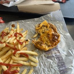 There's a chili cheeseburger with very little chili.