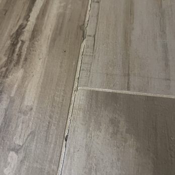 Red Desert Flooring - Porcelain tile where the grout is crumbling and cracking. Owner (Wesley) very unresponsive. - Flooring Near Me - Cottonwood, Arizona Red Desert Flooring - Porcelain tile where the grout is crumbling and cracking. Owner (Wesley) very unresponsive. - Flooring Near Me - Cottonwood, Arizona