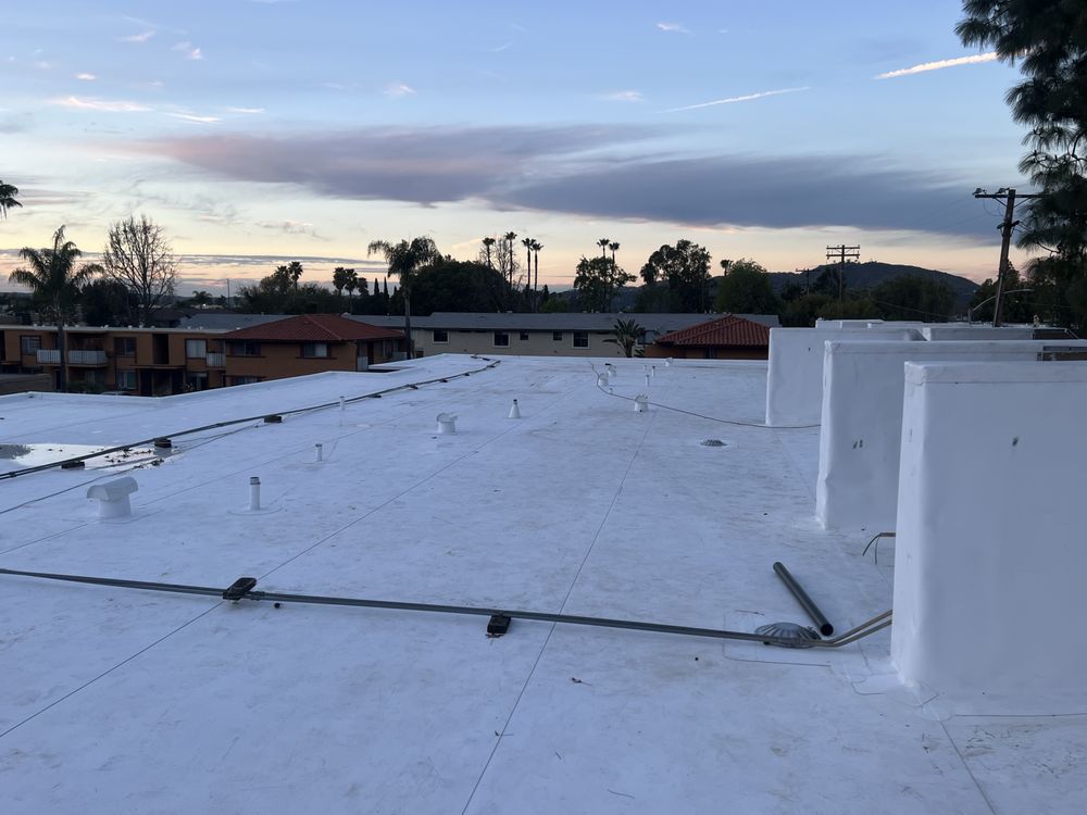 Slide of EZ Solar & Roofing