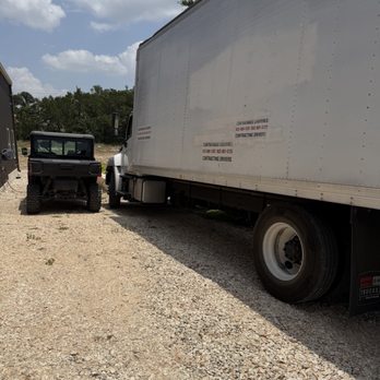 RXO - View of where the truck rolled to from the driver side. - Shipping Centers Near Me - Buda, Texas