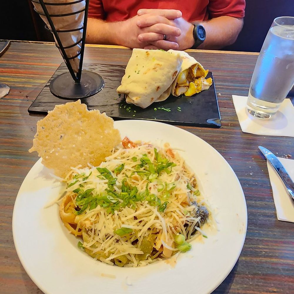 Sisserou's Caribbean Restaurant & Catering - Chicken Rasta Pasta and Roti Wrap with Fried Plantains - Caribbean Near Me - Tulsa, Oklahoma Sisserou's Caribbean Restaurant & Catering - Chicken Rasta Pasta and Roti Wrap with Fried Plantains - Caribbean Near Me - Tulsa, Oklahoma