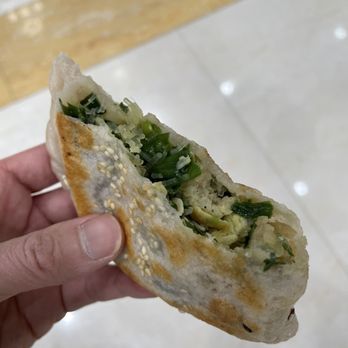 Old Street Pan Fried Dumpling 老街生煎 - $6 for two: Chive, egg, vermicelli "bun" pocket. Kind of like a empanada. Delicious! Huge! - Chinese Near Me - Flushing, New York