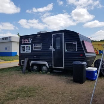 Sniffies Bar B-Que - a black trailer parked in a field - Food Trucks Near Me - Austin, Texas Sniffies Bar B-Que - a black trailer parked in a field - Food Trucks Near Me - Austin, Texas