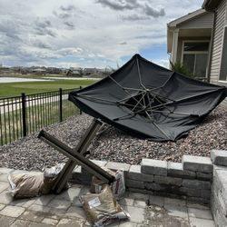 M & E Sales - Sand bags totally 200 lbs could not keep this umbrella from falling.