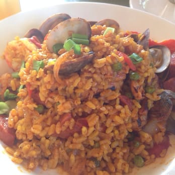 Red House - Red House Paella: prawns, chicken, chorizo, roasted peppers, peas and clams sautéed with saffron rice. Huge portion! - New American Near Me - Renton, Washington Red House - Red House Paella: prawns, chicken, chorizo, roasted peppers, peas and clams sautéed with saffron rice. Huge portion! - New American Near Me - Renton, Washington