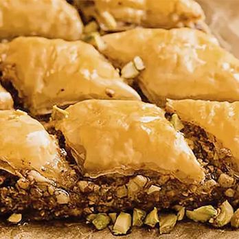 Rifka's Catering - Baklava with Pistachios
Homemade fresh with pistachios, ground cinnamon and butter, layered in sheets of phyllo, baked to crispy perfection - Caterers Near Me Rifka's Catering - Baklava with Pistachios
Homemade fresh with pistachios, ground cinnamon and butter, layered in sheets of phyllo, baked to crispy perfection - Caterers Near Me