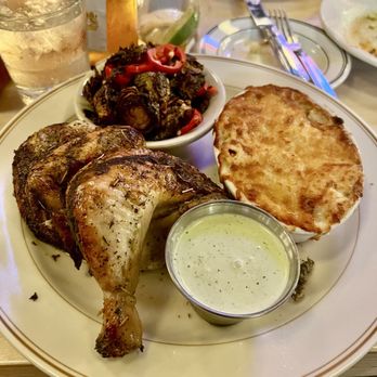 Lincoln Yard - Rotisserie chicken with crispy Brussels mac n cheese and Peruvian chili dip - Comfort Food Near Me - Birmingham, Michigan Lincoln Yard - Rotisserie chicken with crispy Brussels mac n cheese and Peruvian chili dip - Comfort Food Near Me - Birmingham, Michigan