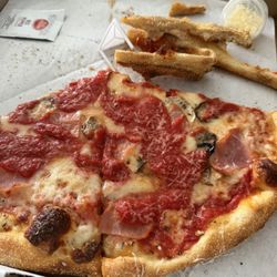 Americana Pizza - Ham mushroom extra sauce extra cheese.