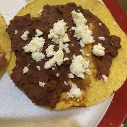 Restaurante The Fenix - Tostada with refried beans and goat cheese (served as an appetizer vs the usual chips & salsa)