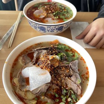 Chopin Noodle House - Lanzhou Braised Noodle (Front) and Traditional Beef Noodle Soup (Back) - Chinese Near Me - Catonsville, Maryland Chopin Noodle House - Lanzhou Braised Noodle (Front) and Traditional Beef Noodle Soup (Back) - Chinese Near Me - Catonsville, Maryland