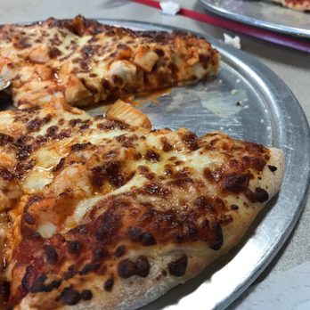 Lions Pizza Den - a half eaten pizza on a pan - Pizza Near Me - Woodbury, Tennessee Lions Pizza Den - a half eaten pizza on a pan - Pizza Near Me - Woodbury, Tennessee