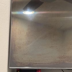 Maggy Maid - You can clearly see where they wiped it, as the corner was the original color of the screen.