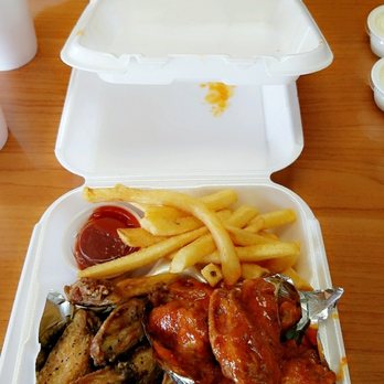 Hotlanta Wings And Things - 15 piece mild & honey barbecue with fries for my lady & a 15 piece medium hot & lemon pepper wit fries for myself. Too much - American Near Me - Riverside, California Hotlanta Wings And Things - 15 piece mild & honey barbecue with fries for my lady & a 15 piece medium hot & lemon pepper wit fries for myself. Too much - American Near Me - Riverside, California