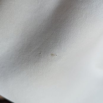 Tide Cleaners - Hole and stain where tide clearly marked where to work on the curtains - Dry Cleaning Near Me - Omaha, Nebraska Tide Cleaners - Hole and stain where tide clearly marked where to work on the curtains - Dry Cleaning Near Me - Omaha, Nebraska