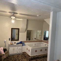Lava Hot Springs Inn & Spa - THE TOILET IS IN THE MIDDLE OF THE ROOM!!!  No door! No Curtain! No privacy!  This place is a dump!