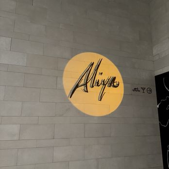 Aliya Cocktail Den - the name of the restaurant on the wall - Cocktail Bars Near Me - Brooklyn, New York