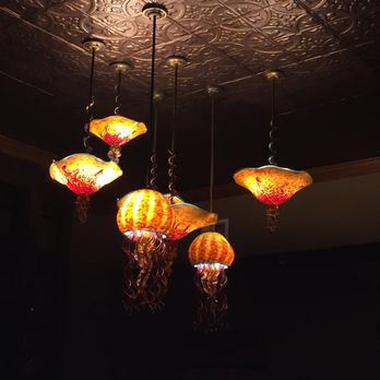 Cabezon - More floating glass ocean creatures hang from pressed tin ceiling - Seafood Near Me - Portland, Oregon