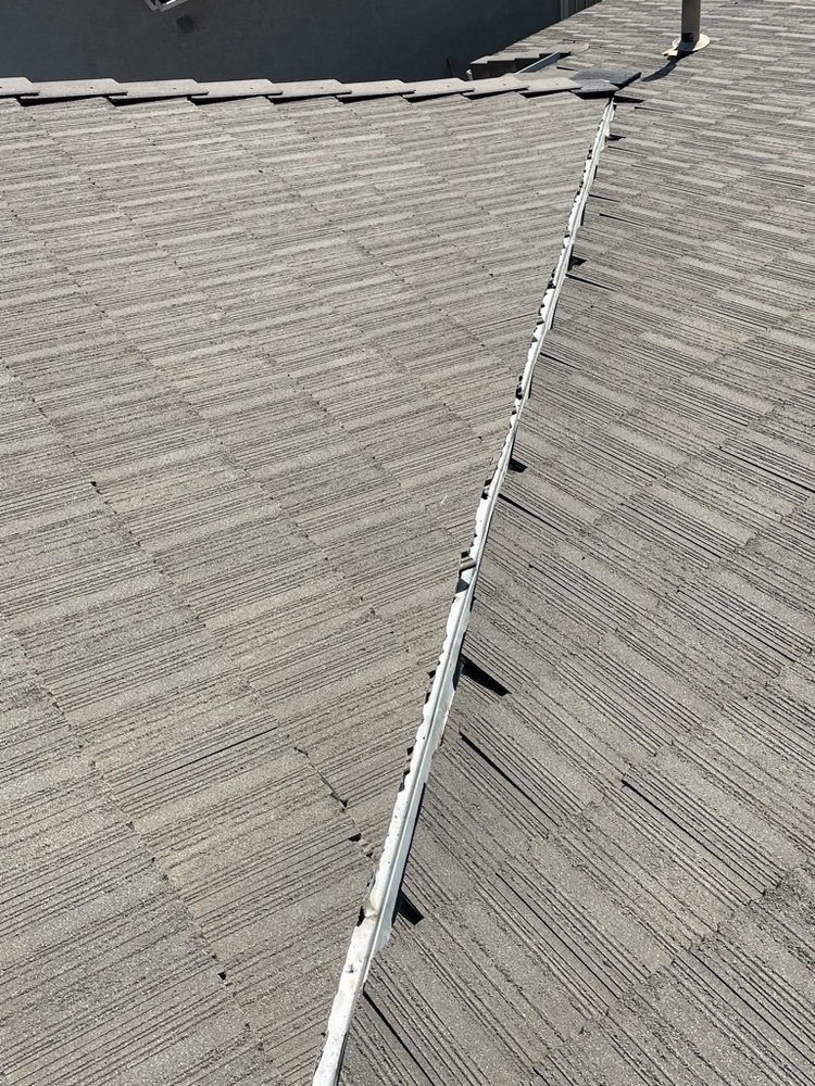 Slide of TMH Roofing