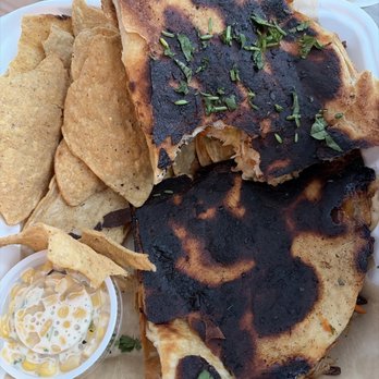 Wonderland Distilling - Thai Chili Chicken Dilla - Cocktail Bars Near Me - Muskegon, Michigan Wonderland Distilling - Thai Chili Chicken Dilla - Cocktail Bars Near Me - Muskegon, Michigan
