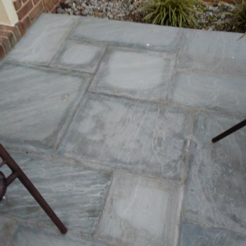Total Stone Construction - Twelve days after a rain up to the present.  That is not wet stone.  That is blotched stone. - General Contractors Near Me - Washington, DC, District of Columbia