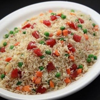 Wee Wok - a plate of rice with peas and carrots - Chinese Near Me - Dayton, Texas Wee Wok - a plate of rice with peas and carrots - Chinese Near Me - Dayton, Texas