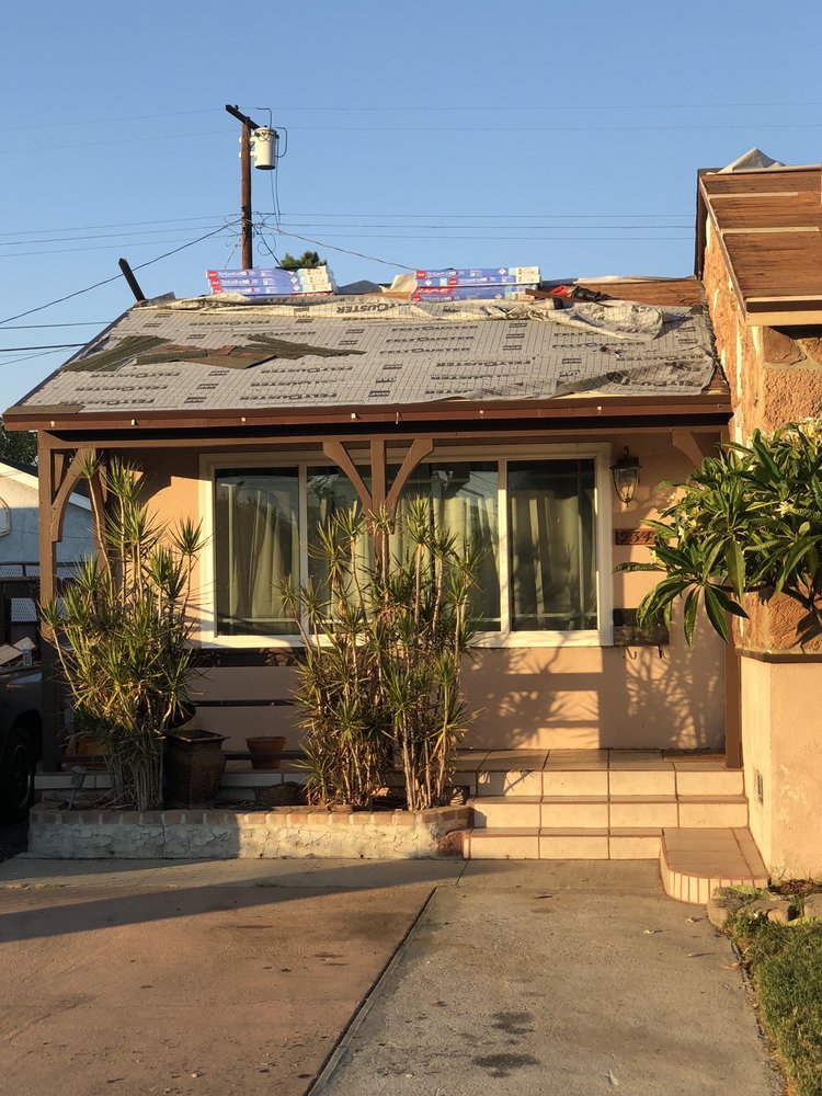 Slide of Arias Roofing Corp