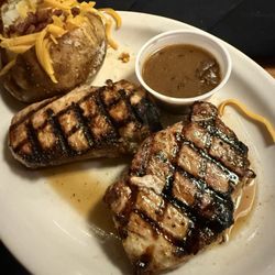 Pork chops and baked potato